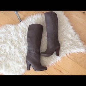 Tall gray knee high boots